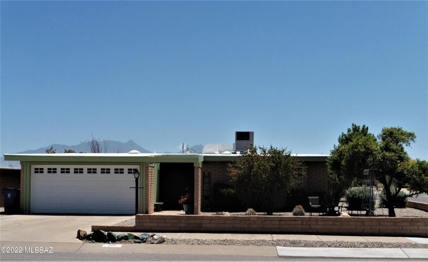Lovely home on a corner lot, private backyard, granite kitchen counters, all tile flooring, storage, fruit trees, and a covered patio makes this the ideal house for quiet enjoyment and fun gatherings.  Popcorn free ceilings.  GVR available. Small storage shed and window AC unit do not convey.