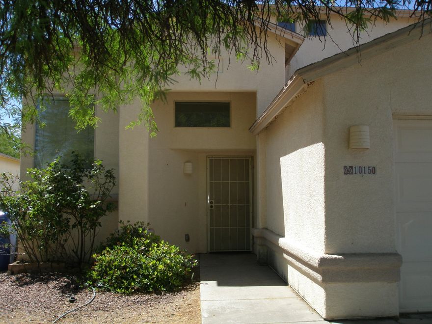 Two-story 3 bedroom, 2 1/2 bath home looking for it's new owner to give it minimal TLC  and make it your home sweet home. Located in the Vail School district, near schools and a park. Home also has an electrical box for a spa.