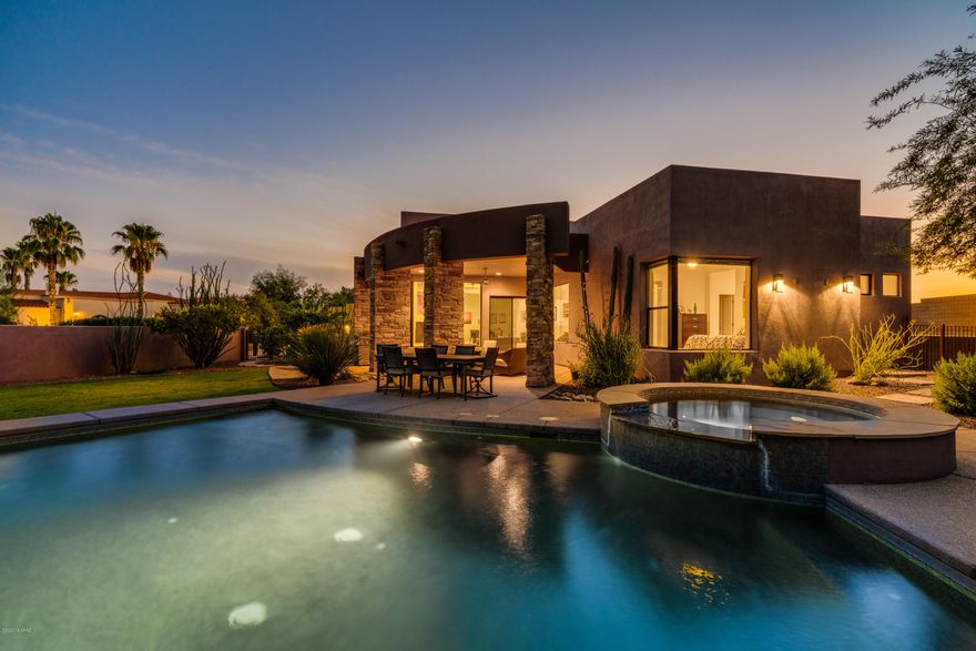 Spectacular Catalina Mtn views from inside and out of this classy Contemporary in the coveted 3RD Fairway in Oro Valley Country Club! Built in 2006 and architecturally designed for efficient use of space and S/E orientation to capture the majestic views, this  original-owner home is meticulous in every way. 2601sf w/creamy beige concrete flooring throughout (No carpet), 3BD, 3BA PLUS Office or multi-purpose room. Vaulted ceilings and large windows escalate the natural brightness inside. Great Room w/mountain, pool and patio views, gas fireplace, media/art niches. Kitchen offers SS appl, gas cooktop, solid maple cabinets galore. Master suite has views, updated bath & access to patio/pool. Backyard has a touch of grass, gorgeous pool, cascading hot tub and firepit. Private culdesac location.