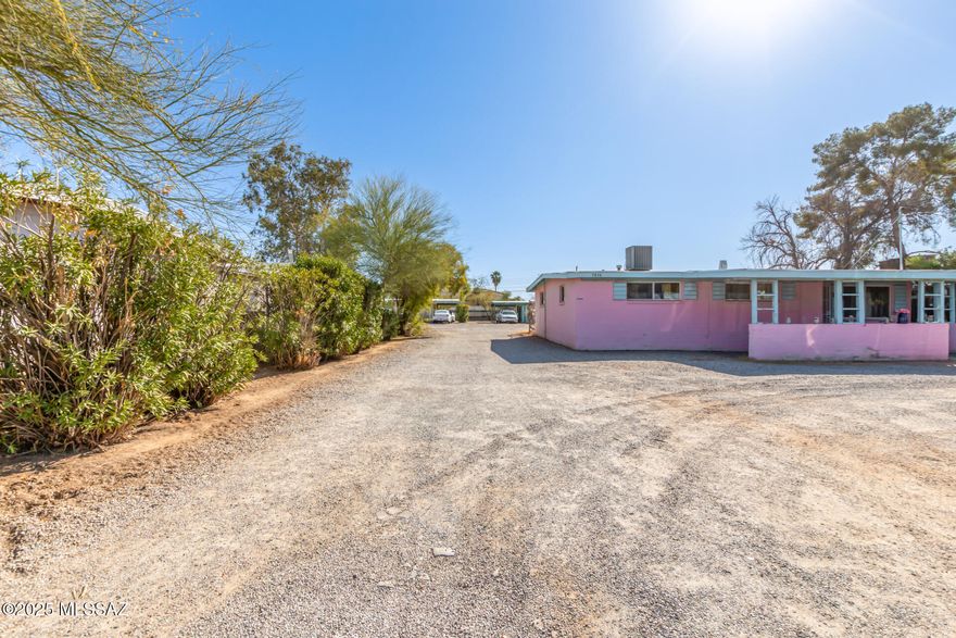 Great investment opportunity! 7 total units consisting of 5 separate houses and 1 duplex  on 2 separate tax codes (parcels) for ease of financing, and must be sold together. There are a total of 16 bedrooms and 8 bathrooms. Each unit has washer and dryer hookups,. fenced yards and tile floors. Most units have HVAC or mini splits (3 new in last year) and some have individual carports. Large private driveway into property adds plenty of parking space, security and privacy. Some rents have been recently increased, but their is more room to increase for current market rates. Square footage, income and lot size are combined total for both properties on the listing. Call listing agent with questions or more information.