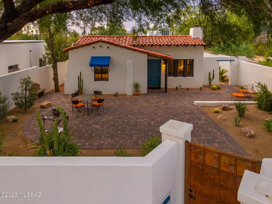 Built by Josias Joesler, 1937. Listed in ''National Register of Historic Places''. A Property of Distinction, now revitalized and preserved with the quality of today's ''High Style''. The home is a tribute to Tucson's most influential architect, once described as an ''Architectural Linguist''. 2BR/1B Home and attached BR/BA Guest Quarters are joined by a private 245 sq. ft. ''Pool Cabana'' outdoor room overlooking pool and enchanting rear yard. MTN views! Corner Lot! Stone Terraced Patios. Custom Iron Gates. Charming walkways, patios and prized cacti connect front & rear yards. New Underground utilities to ensure the wonder of the property remains unobstructed. Plus, new 220 electric to garage gives a nod to a future of electric cars. A Tucson Treasure , an Enchanting Joesler Home.