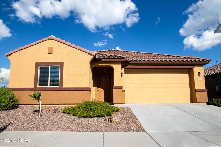 This home offers a great layout with private spaces within an open floor plan. Features include a versatile room for a den or office and a second entertainment area for kids or teens. Enjoy tile flooring, granite countertops, shaker cabinets with crown molding, built-in appliances, recessed lighting, and a center island with a breakfast bar. The primary suite has plush carpet, a private bath, and a walk-in closet. Nestled on a corner lot with mature landscaping, the home offers stunning mountain views, perfect for walks and sunsets. Solar panels ensure low electricity bills, and the backyard includes a built-in flat-top grill for entertaining. Note: Listing agent has a financial interest in the property (Owner/Agent).