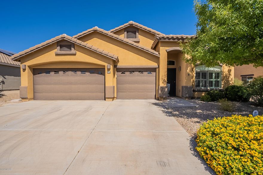 Welcome to your STUNNING new home! This beautiful and highly upgraded homes has 4 bedroom, 2 bath aand a large 3 car garage on a large, beautifully landscaped lot in the upper-end area of Presidio Del Saguaro. As your guests enter, greet them in the formal living and dining room. The Chef in the family will appreciate the spacious gourmet kitchen with granite counters, breakfast bar island, SS appliances including a double oven. Relax by the fireplace in the family room. Over-sized master suite & master bath has dual sink vanity, separate tub and shower with direct access to the backyard hot tub. Big backyard is beautifully landscaped w/BBQ island, gazebo w/hot tub and several seating areas. Plantation shutters throughout.
