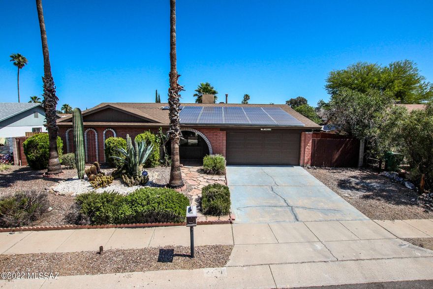 Great Northwest Location! Wonderful 3 bedroom 2 bath and 2 car garage. Freshly painted, open and bright, formal living space and family room/dining area with a cozy Beehive fireplace. Spacious kitchen with island, granite, SS appliances and ample cabinet/counter space. The primary suite boasts a large closet area and sliding doors that lead the the pool. Enjoy the Beautiful backyard, perfect for entertaining, with a covered patio, mature trees, artificial turf, flagstone and a separate gated area with the refreshing pool/spa. This won't last long, come take a look today! BRAND NEW AC! just installed!