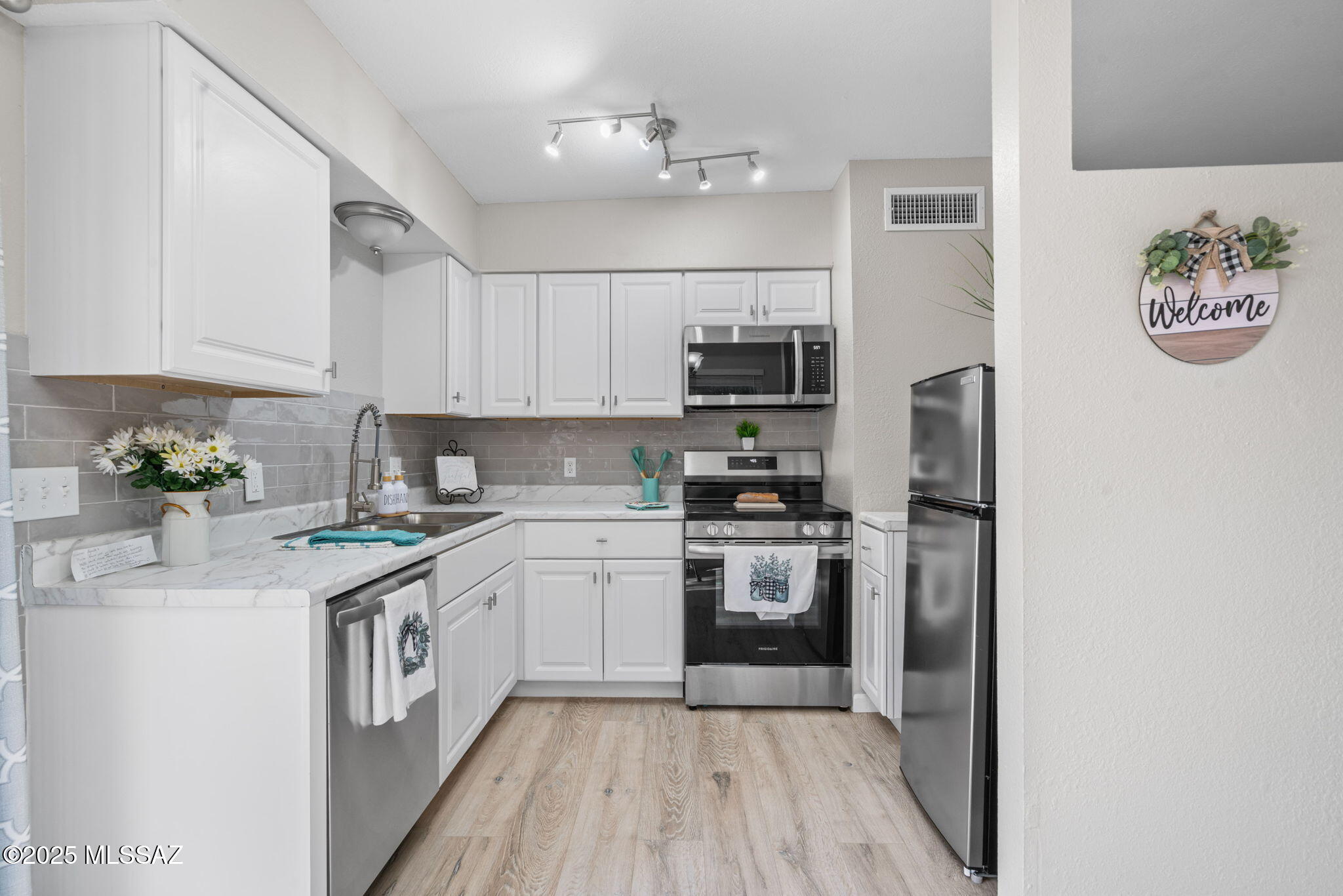 211 W Roger Road 33