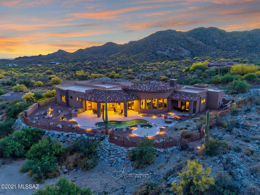 A great ''Florence'' model footprint in this single story plan, featuring Catalina Mountain views thru tall windows overlooking the pool and spa sited on 2.0 plus acres. The core of the plan is the Great room with a fireplace, the adjoining formal dinning room, and cook's kitchen featuring Wolf and SubZero appliances create the center of this home. French doors from the Master bedroom, Great room and kitchen lead to the outdoors of Stone columns, a large covered enclosed front porch, and two rear patios with Travertine tile overlook the pool, spa, and firepit. Complete  with low maintenance materials, a large 3 car garage, and privacy.