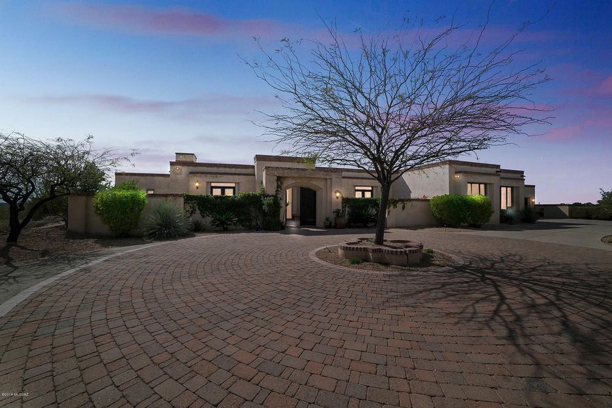 This 2.25 acre hilltop lot has incredible city and mtn views. Exquisite Attention to detail in every room. Gourmet kitchen features, 6 burner Dacor range,pot filler,2 Bosch DW,Sub Zero refrigerator, built in Miele Coffee Maker, Huge Granite Island with seating for 5,separate ice maker, 2 undermount sinks,warming drawer,large walk in pantry. Temperature controlled Wine Room. The Master bedroom features customized walk in closet with built in ironing board, Large walk in shower and garden Tub. 8' Knotty Alder doors stained on Site. Pella Windows, 8'' baseboards, Russound Audio Throughout,4 Fireplaces,Plaster Walls. Custom Cabinetry built in for Living Room and Office with desk and bookshelves. Custom built in daybed seating and bookcases in 2 bedrooms.Separate Guest house. Views Views View