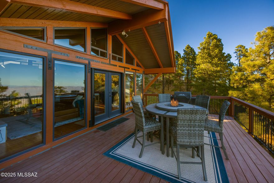 VIEWS, VIEWS, VIEWS from this beautiful Mt. Lemmon getaway. 
Under contract, but seller accepting back up offers 
An entertainers delight, including over 1,000 square feet of deck, open kitchen/great room and unobstructed views.  Watch the incredible sunrise from multiple outdoor spaces . 
Huge windows, amazing natural light and ample storage.   
This mountain home is impeccably maintained with new deck finish, new exterior paint, new interior paint and so much more.  Updated plumbing and 200 amp electric.  
You'll love the separate office, art studio or  bedroom. With2 Queen beds.  It's heated and has it's own deck! 
Need another bathroom? 
1000 gallon septic tank!  See Pima County guides.  Year round access NO  Short Term Rentals
