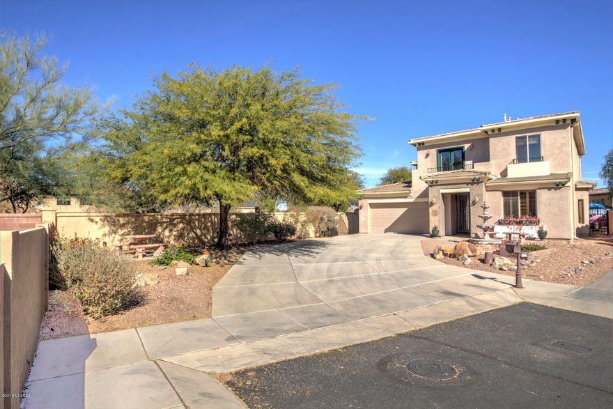Short Sale Approved at $279,000.Located in a sought out, gated subdivision & in a cul-de-sac this beautiful 3BD/3BA + Office/Den 2,672 Sq Ft home welcomes with a formal living & dining area w/lots of detailed architectural features, paintings, light fixtures, plantation shutters & tile/wood flooring throughout home. Open concept of great room & kitchen. Great room offers access to an Arizona room that leads to your very own private flamingo oasis. Kitchen features granite counter tops, a breakfast island/bar with tile back splash, eat-in breakfast area, plenty of cabinetry space w/pull out drawers, lazy Susan & stainless steel appliances. Down stairs there is also a hallway full bath with a walk-in shower, an office/den with a Murphy bed & storage space. Lighted staircase leads upstairs to an elegant loft with access to a balcony w/mountain views, a laundry room w/built-in shelves, 3 bedrooms w/Berber carpet or wood flooring, and a Jack & Jill bathroom with shower/tub, dual cultured marble sinks. Master suite bedroom features balcony access, dual vanities, a jetted tub, walk-in shower, a heated lamp & spacious walk-in closet. Enjoy your days in your own private oasis with a pebble tec pool w/a waterfall & hot spa, built-in grill, pond, mature vegetation & much more. home is located within walking distance to Sahuarita Lake, clubhouse & close to dog park, schools, restaurants, shopping centers & much more!
