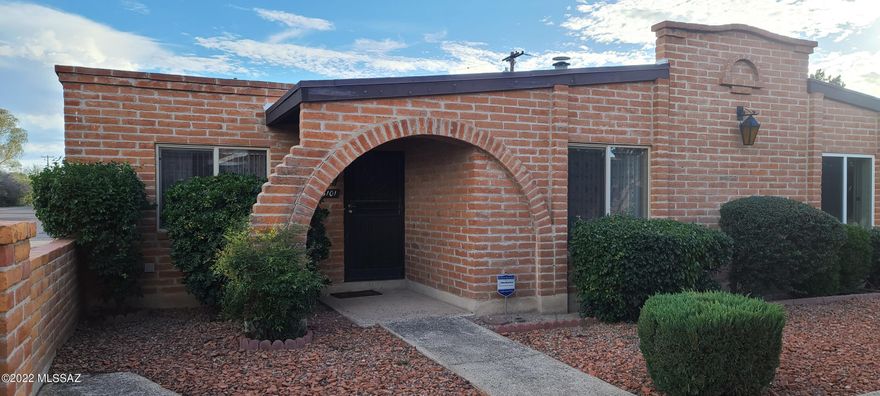 Lovely corner lot townhome in Spanish Village. 2bd/2ba home with tile throughout. Both bathrooms have had full updates with tile finishes, quartz countertops and skylights. Both bedrooms are spacious with walk in closets. Roof re-coated in 5/2022, new dual pane vinyl windows and sliders, xtra storage in carport. plenty of guest parking. Back yard boast lovely mature plants private setting with a covered pergola providing all day shade. Perfect spot to sit and enjoy a beautiful day. This home has been well taken care of. This community offers a refreshing pool, shaded sitting area and BBQ for entertaining. Great central location close to everything! Neighborhood YMCA 2 blocks away.