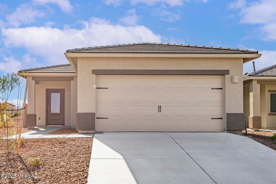 This charming 3-bedroom, 2-bathroom home defines modern comfort. This cozy residence features a spacious great room, breakfast area, private master suite, & a 2-car garage. Included upgrades enhance your living experience, with energy-efficient appliances, quartz countertops, wood cabinets & more. Three bedrooms ensure everyone has their own room to spread out, with flexibility to use an extra bedroom as a guest space or home office.
Indulge in the luxury of a private master suite. The bedroom easily accommodates king-size furniture & the walk-in closet & private bathroom provide the ultimate convenience. This home's curb appeal is a visual delight with a professionally landscaped front yard. The attached 2-car garage comes with a Wi-Fi-enabled door opener for your convenience.