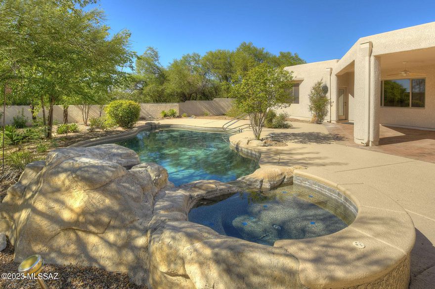 This beautiful house is located in the gated community of Madera Mesa Estates. As you step inside, you'll notice a formal dining area, perfect for hosting dinner parties or enjoying family meals. The kitchen is a chef's dream, featuring a five-burner gas range, double ovens and an island with a prep sink.
The primary suite is truly luxurious. It boasts a gas fireplace, creating a cozy and inviting atmosphere. You'll also find two walk-in closets, providing ample storage space. The ensuite bathroom features a relaxing garden tub and a convenient walk-in shower. You will marvel at the beautifully landscaped backyard.
Imagine hosting summer barbecues in the outdoor kitchen area or taking a refreshing dip in the sparkling pool. Madera Mesa Estates is the perfect place to call home.