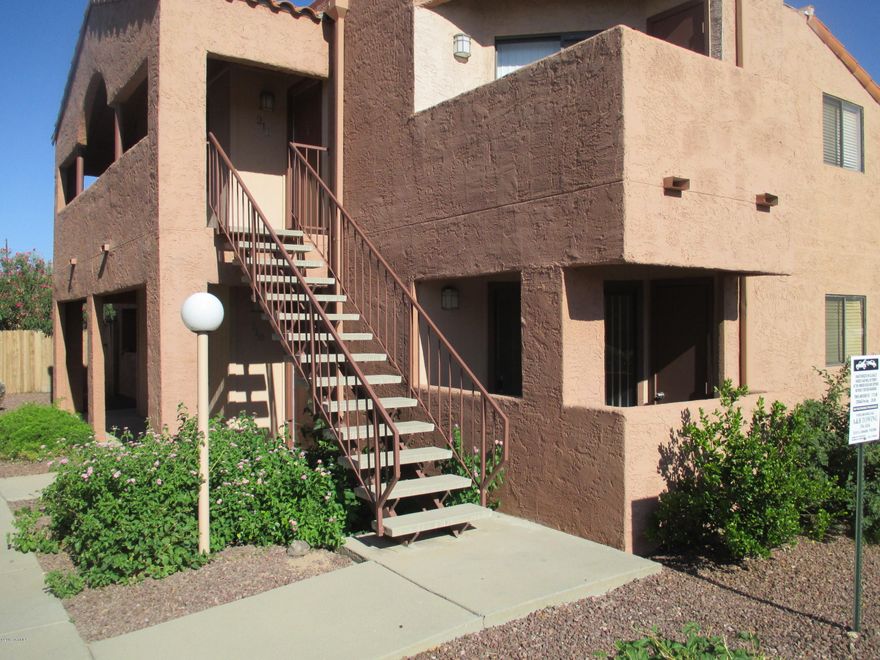 Desirable two-bedroom first floor condo close to the University of Arizona, UA Medical Center, bus lines, and shopping along Campbell.  Gated community entry and location near the pool and rec. building. Updated kitchen and bath with fireplace in living room and covered porch with storage closet. Nice bedrooms with new window coverings. Great location with two parking spaces right in front of the unit! See it today!