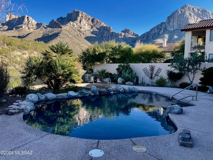 Check out this gorgeous, updated, well-maintained home on a high view lot in the Bighorn Point subdivision in guard-gated La Reserve. Enjoy lush and beautiful landscaping front and back, PebbleTech pool with spa and both up-close Pusch Ridge and distant city lights views. Great Room, split-bedroom floorplan with high ceilings and upgrades galore. Extras include a sleek vented linear gas fireplace, wood shutters, pre-settable thermostatic dial shower temperature control in owner's bath, 16-SEER Main HVAC unit, power screen for sun/bug control on the patio, power cover for the pool that can be removed and stored, and an extra space in the garage for storage or workshop.