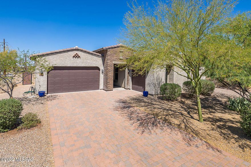 Exquisite 4BD/3BA +Den (2,753 sq ft) home with pool resides on a corner cul-de-sac lot in gated Rancho Del Cobre. Open-concept, split bedroom plan affords luxurious amenities. Inviting front courtyard flows to an expansive Great room showcasing high ceilings, oversize tile and walls of windows. Sleek gourmet kitchen boasts center island, rich hued cabinetry, granite counters w/decorative backsplash, SS appliances w/double ovens plus dual pantries. Striking bonus room has barn door entry. Retreat to a luxurious Owner's suite hosting dual vanities, soaking tub plus walk-in shower & closet. Guest wing offers 3 BD's, full bath + powder room. Enjoy the private, resort-style yard with covered patio, faux lawn, gas firepit and heated pool with water feature and Travertine surround. A must see!