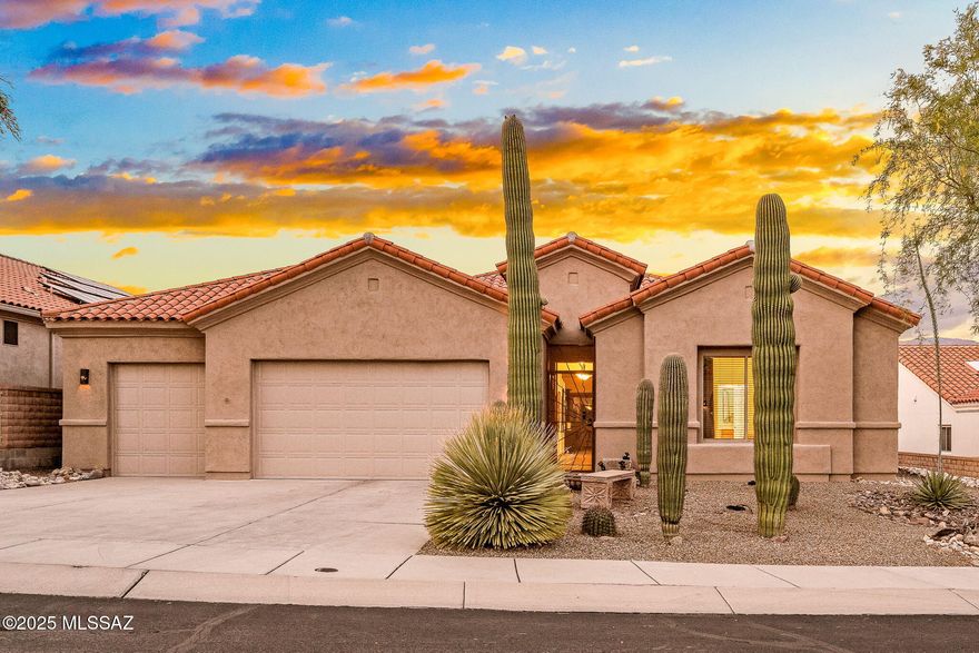 Immaculate home in charming gated community! Beautifully maintained home has 3 bdrms and den—with closet—could be 4th bdrm. Enjoy open floorplan with high ceilings and mountain views. The chef's kitchen and breakfast bar offers plenty of prep space. Step into the enclosed Arizona room opening to a gorgeous, easy-care yard—perfect for year-round enjoyment. The large 3-car garage includes a separate third bay with ductless A/C, ideal for a workshop or gym setup. The primary suite includes a huge walk-in closet and an updated bathroom featuring floor-to-ceiling tile and a walk-in tub. Throughout the home, you'll find stunning concrete overlay flooring. Enjoy community pool/spa, and a recreation center and nearby shopping, banking, and top dining spots—you won't want to miss this oppor