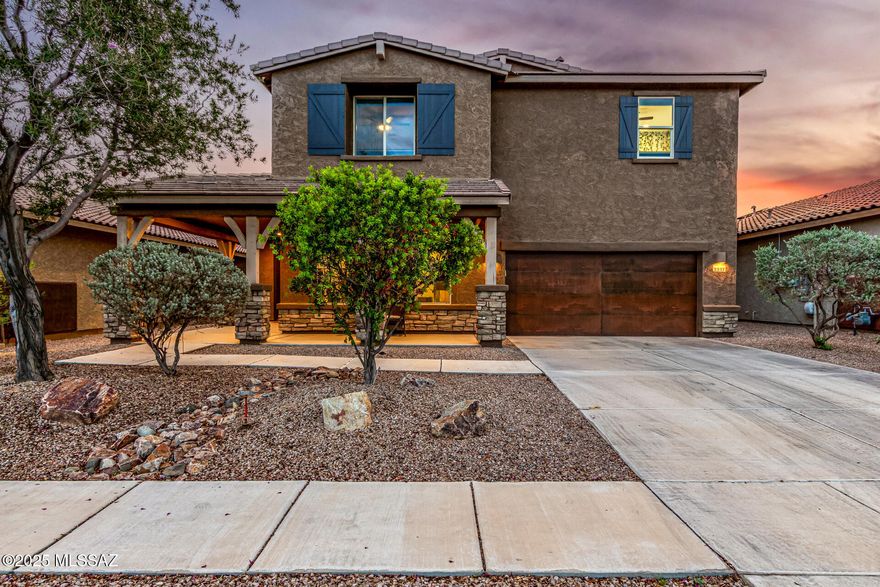 Nestled in a quiet gated community within a highly desirable Oro Valley neighborhood, this 2016 turn-key 4 bed, 3.5 bath home is a must-see. Thoughtfully styled and move-in ready, the open-concept floor plan features wood-look tile flooring, stainless steel appliances, and light-filled rooms with a timeless neutral palette.

The heart of the home is the bright and inviting kitchen, complete with granite countertops, an oversized island, double ovens, a 5-burner gas cooktop, walk-in pantry, and all Whirlpool appliances.

Enjoy year-round comfort with a top-of-the-line HVAC system, installed just a couple of years ago, a 17 SEER unit that delivers exceptional efficiency and peace of mind. Outdoor living is equally impressive, featuring a heated saltwater pool, built-in natural gas BBQ, cozy gas fire pit, lush greenscape, and breathtaking views of both the Tucson Mountains and Catalina Mountains.

Schedule your private showing today. This home blends style, efficiency, and Arizona living at its finest!
