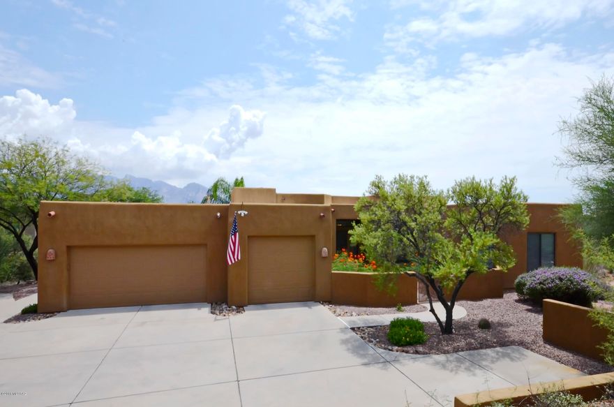 Fabulous four bedroom, plus den, three full bath, semi-custom home in wonderful Vistoso Estates. Long winding driveway leads to private southwest contemporary home which fits any lifestyle. Open kitchen to greatroom with fireplace. Formal dining area, separate den off greatroom. Second family room, or teen room leads to terrific guest suite. Concrete floors in living areas. Great entertaining rear yard with pool/spa and grill area under lattice patio cover. Large windows and sliding glass door offer abundant natural light and allow for great mountain views. Private cul-de-sac lot. Over-sized three car garage. New stainless steel appliances. Great home, lot and neighborhood.