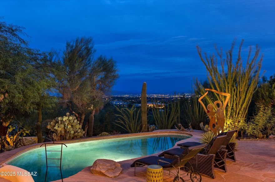 Discover timeless elegance in this stunning Ray Birch-designed home, perfectly situated to capture breathtaking city lights and sweeping mountain views.
Thoughtfully crafted with attention to detail, this residence combines sophistication, comfort, and functionality.
The main home features spacious living areas filled with natural light and inviting spaces ideal for both everyday living and entertaining. Expansive windows and outdoor patios create seamless indoor-outdoor living, showcasing the surrounding scenery.
A private guest house provides comfort and independence for visitors, extended family, or even a home office or studio.
With its beautiful architecture, exceptional setting, and panoramic views, this home is a rare opportunity to experience the best of desert living.