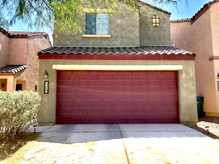 Beautiful two-story home located in the highly desirable community of Rancho Sahuarita! Gorgeous abundance of ceramic tile throughout this home with a beautiful interior paint scheme! This open floor plan with large kitchen includes all black appliances and cabinets with crown molding! Big master bedroom has walk-in closet! Backyard has been landscaped to your expectations! Rancho Sahuarita can provide you with the perfect family functions at nearby parks, pools, recreational center, basketball and tennis courts and so much more! Close to shopping centers, schools and easy access to the interstate!