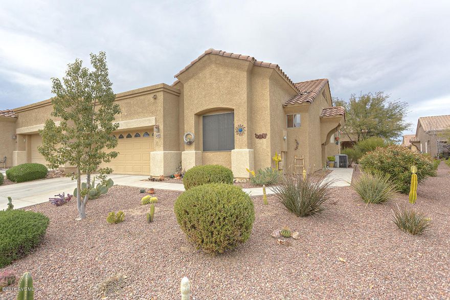 You will love this 2BD/2BA end-unit in the ever popular and gated community of Las Campanas Village. An open floor plan design with split bedrooms awaits you and highlights a large Master Bedroom, dual sinks in master bathroom along with walk-In closet, laundry room, carpet & tile in all the right places and more!! Enjoy peaceful living on your covered back patio overlooking the green common area nearby or take a stroll to the fountain or continue on trail through the community. Located close to golf, shopping, dining, entertainment and more!! The perfect home for Green Valley living.