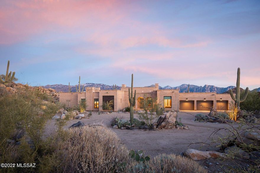 Beautiful Adobe Spanish Colonial designed by architect, Clint Miller on one of the best lots in gated Stone Canyon with gorgeous views. Home built in 2019, designed to the finest details. Two primary suites. Chef's kitchen with luxury high end appliances.