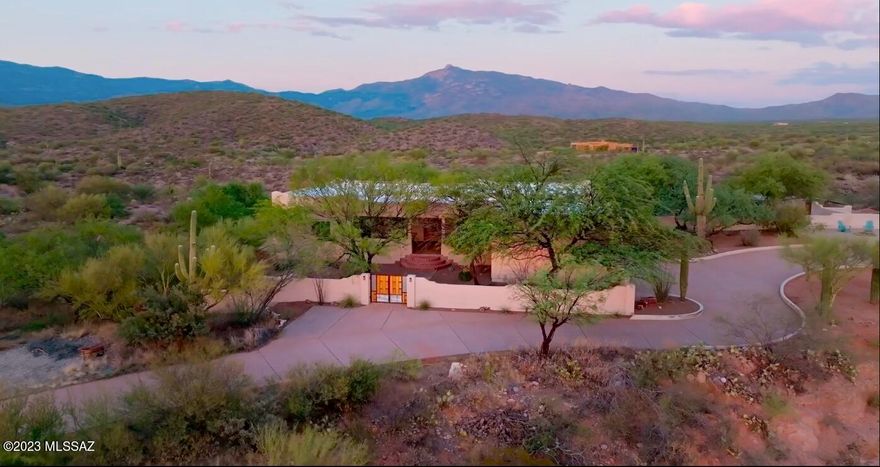 SELLER TO CREDIT 10K TO BUY DOWN RATE OR USE TOWARDS CLOSINGS COSTS WITH ACCEPTABLE OFFER - AND PRICED BELOW RECENT APPRAISAL ($825k)! Perched atop a scenic hill, this property encompasses 6 fully fenced acres of serene land, presenting an undeniable allure that demands your attention. Be sure not to miss the captivating showcase video, which offers a comprehensive view of its remarkable features. The dedication of the owners shines through in every corner; they have not only maintained the property immaculately but have also made substantial investments in enhancing its structural foundation. It's now poised for you to infuse your unique cosmetic preferences. Refer to the complete list of updates in the seller disclosure to fully appreciate the care that's been poured into this home. Coyote Creek boasts an expansive main living area spanning 2,537 sqft, with an additional potential living space of 2,510 sqft waiting to be discovered in the basement. A sweeping split-circle driveway leads you to the property, where your guests will be welcomed through a secluded enclosed courtyard and a generously sized covered front patio. The fluidity of the great room seamlessly blends with the open-concept floor plan, providing an effortless flow for both daily living and grand gatherings. The spacious kitchen features appliance garages, ample cabinetry, a built-in bar, a separate dining room, and treats you to stunning views of the Rincons.

Designed with practicality in mind, the bedrooms are thoughtfully laid out in a split configuration, with each of the 3 bedrooms occupying its own corner. Two of these bedrooms offer large en-suite arrangements, and the secondary ensuite even offers private access to the backyard. The third guest bedroom is conveniently adjacent to the 3/4 guest bath. The primary suite boasts an oversized layout, a spacious walk-in closet, separate shower, jacuzzi tub, and split vanities.

The property accommodates both an attached two-car garage, freshly painted and measuring 29x22, with convenient steps leading into the kitchen area. Moreover, a substantial detached garage spanning 29X29 provides abundant space for all your RV/Boat/workshop and storage needs. Adjacent to this garage, you'll find a generously sized enclosed garden space, complete with flourishing planters, covers, and drip irrigation.

Summers become a delight with the inviting pebble tec pool and spa, complemented by a charming water feature and a picturesque backdrop. A well-maintained private well ensures a reliable water supply, while the updated septic system guarantees worry-free functionality with its new piping.