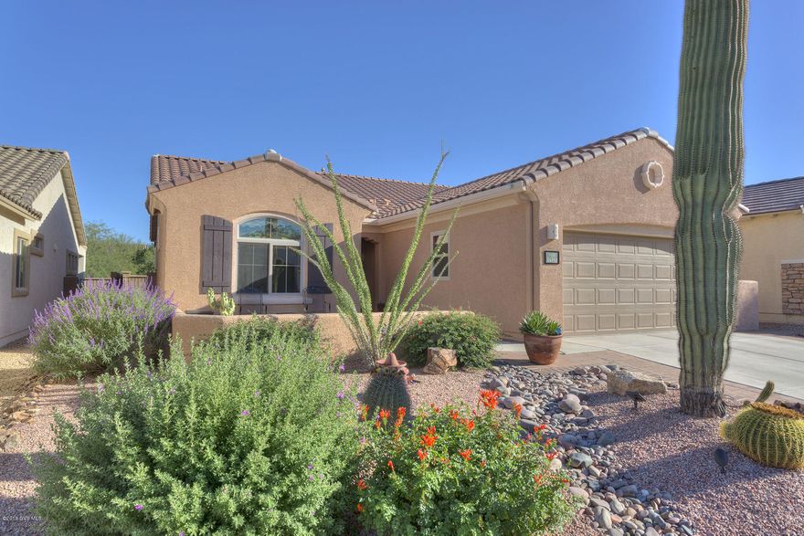 Gorgeous move-in ready 3BD/2BA/2GARAGE home in Rancho Sonora, a Del Webb active adult community within Rancho Sahuarita. Wonderfully private lot overlooking a wash on a cul-de-sac street. Tastefully appointed throughout, this open floor plan with spacious kitchen, dining area and great room leads to a charming covered southeast-facing patio that is shaded as the sun sets to the west. Enjoy all the communities' amenities including, pools, spas, water park, pickle ball, bocce ball, fitness center and more.