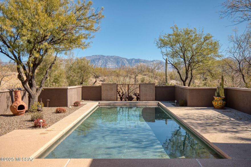 Estate sale offers fabulous opportunity to acquire and update 3,712 SF home designed by Tucson's renowned architect Ron Robinette and quality-built by Marc Allan Construction in guard-gated Stone Canyon! Great room design with excellent layout just needs updating to make this your own special place. Sold AS IS, this lovely great room style home includes 4 bedrooms, 4 baths, Den/Office, 3 Fpls, pool, large 3-car garage PLUS east-facing Catalina Mtn views AND lots of privacy! Enclosed courtyard leads to open design that can be styled contemporary or traditional. Spatially desirable home includes chef's kitchen (Sub-Zero & Viking), charming nook with Fpl, generous primary & split layout. You'll love the potential of the gigantic pantry & huge laundry. Great home ready to be made even better!