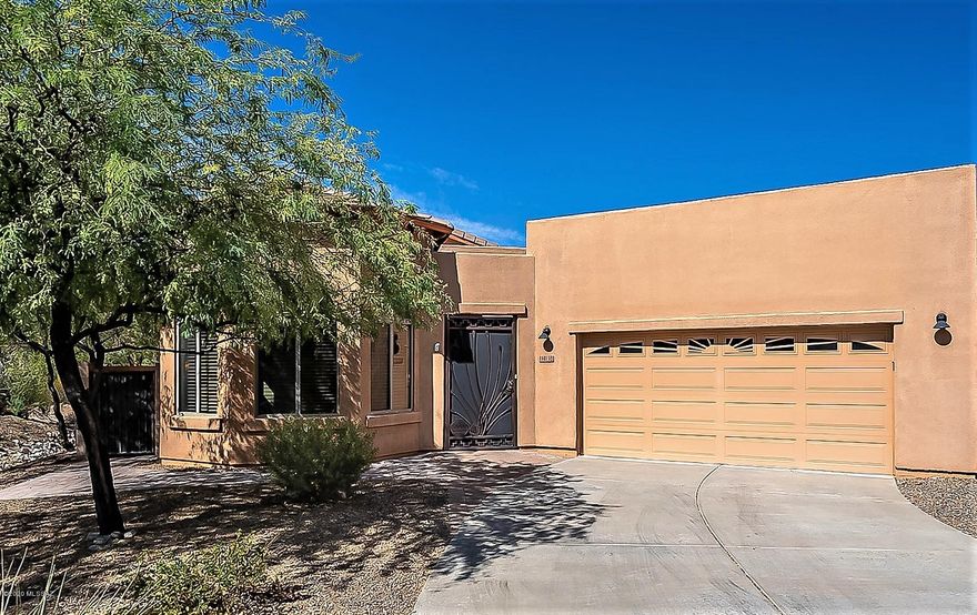 Pride of ownership, amazing views and privacy abound in this immaculately maintained Santa Fe home located in
the highly desirable Continental Reserve. No detail was overlooked in this southwestern gem starting with a custom built office for two to comfortably work out of home or home school.  Maple cabinets and granite like art are the centerpiece of the kitchen.  Sunlight  floods in rom the clerestory windows.    Dramatic 13' ceilings in Great Room , lighted niches, gated front courtyard w/pavers, mini-splits & more.  This home features cozy eating areas & an outdoor spaces to enjoy a drink in the morning or an evening watching an amazing sun set behind Sombrero Peak after a long day. Check out the Matterport 3D Floor plan under the Virtual Tours tab. 
Welcome Home!