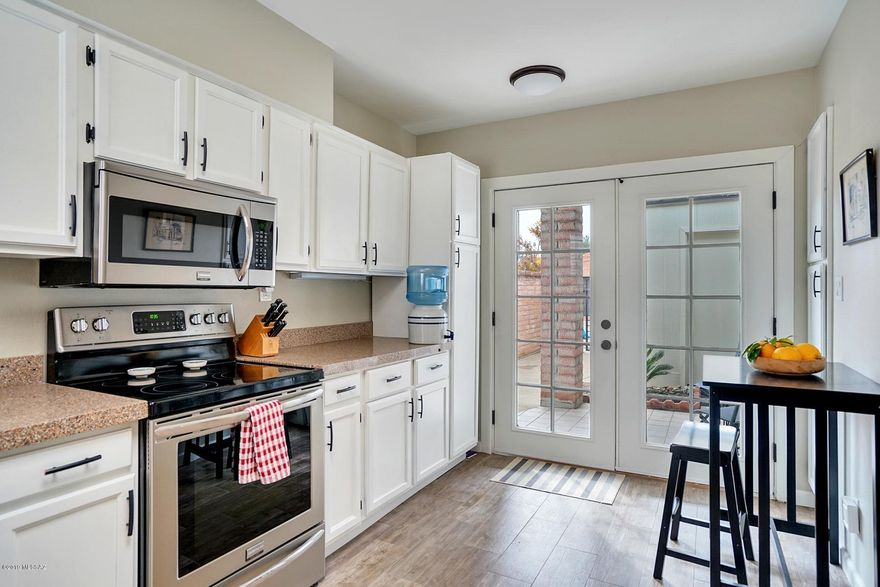 Beautifully remodeled townhouse in Tanque Verde Estates. Mountain views of the Catalinas from the covered patio. Two bedrooms and two fully renovated baths. Renovated kitchen with new stainless appliances. Two car garage. Community pool and rec center. All you have to do is move right in!