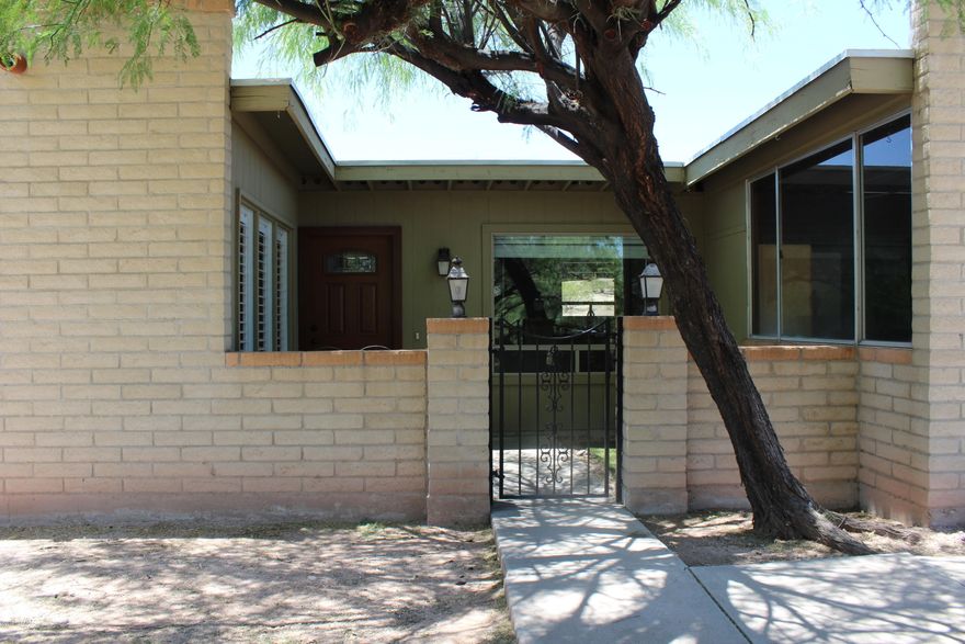 If peace and quiet is what you're looking for, welcome home!  Everywhere you look there are gorgeous mountain views. Over half an acre of quiet space already includes a swimming pool. Newly built in 2006, you'll have to fight the urge to jump in! Pump was replaced in 2018. Once you step inside you will know you are home! The versatile space can be divided to fit your lifestyle or left open and fluid. Four bedrooms allows everyone their own personal space. Enjoy the front courtyard without concern of getting too close to the wildlife. The serenity of this perfectly placed home will make it difficult to leave. Come and see what you've been missing.