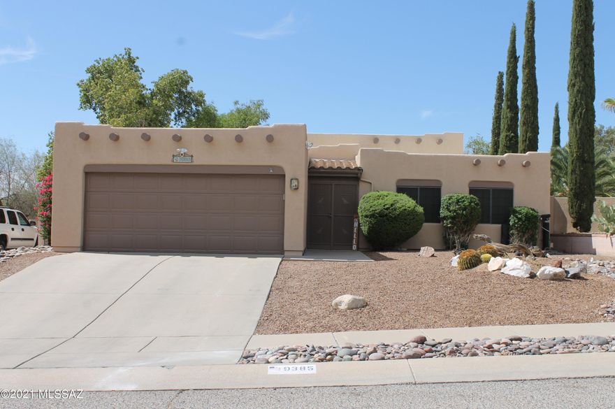 Southwest style home, updated, beautiful and bright.