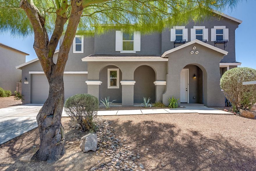Beautiful 2 story home located in Southwest Tucson! This property offers an open floor plan and many tasteful upgrades throughout! The upstairs den has been enclosed and can now be used as an additional room or an office for those who work from home. It comes with gorgeous mountain views, a backyard fit for entertaining and minutes away from Old Tucson Studios, Desert Museum and other hiking trails. The only thing missing is you!