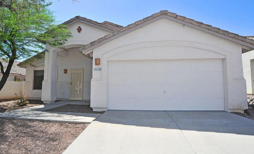 Cozy East side gem! Great little home with 16'' ceramic tiles, high ceilings, and newer carpet throughout. Upgraded kitchen has stainless steel appliances, tile counter tops, breakfast nook, and opens to main living area with large gas fireplace. Spacious master bedroom has garden tub, separate shower, and walk-in closet. Perfect location, 15 minutes from DM Air Force Base, and all east side amenities. Owner is licensed to sell real estate in AZ and is offering a home warranty from 2-10 HBW. Don't miss this must see property!