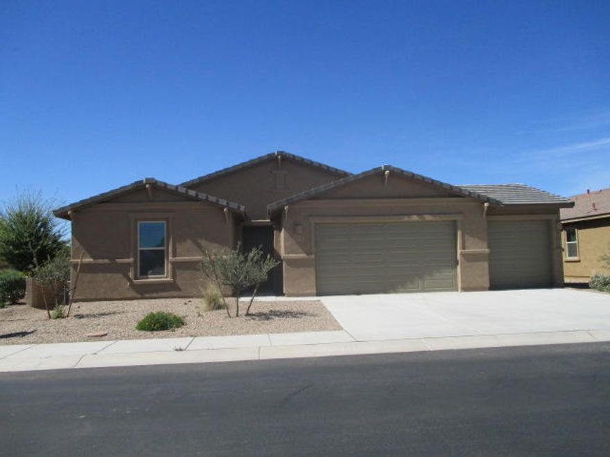 Nicely upgraded home with all plank tile floors. Cooks kitchen with granite counters, SS appliances, double ovens and a butler pantry area. Split bedroom plan with 3 bathrooms. Backyard is nicely finished with an extra covered patio and a built-in grill.