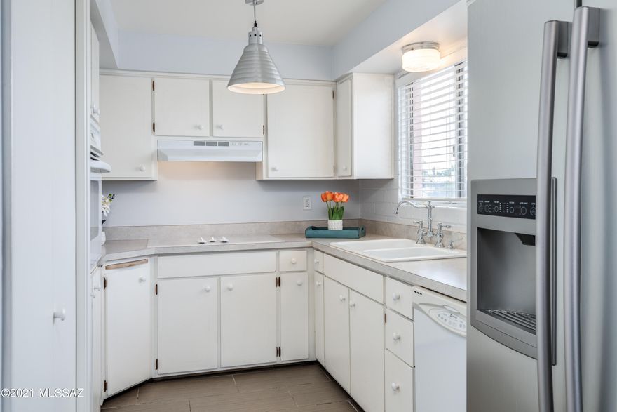 Great opportunity to own a well-maintained & move-in ready condo in Central Tucson! Make it your home or a good investment. The property was continuously rented since 2015. Not a single day of vacancy! Large 2nd floor, end unit with lots of natural light. Spacious living room & bedroom with walk-in closet. Updated bathroom with newer vanity & granite counter. Upgraded kitchen appliances, including stainless steel refrigerator. The entire unit is freshly painted & has brand new carpet. The complex has a pool & great mountains view. Convenient location within biking distance to the U of A & Banner UMC. Walking distance to bus stop, Whole Foods, Loft Cinema, coffee shops & restaurants. Reasonable HOA covers exterior, roof, water/sewer, gas (heating), trash & termite/pest control. Owner/agent.