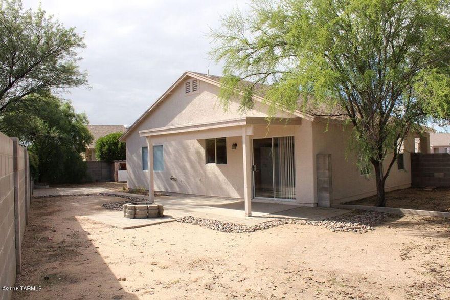 Pathway to Purchase Perfect! Ask your lender if you qualify for a grant to buy this fabulous home! Low, Low HOA fees. New paint inside and out! Great over sized yard! Great home whether you are downsizing, just starting out or somewhere in between! Master has two wall closets. No carpet anywhere!! Spacious 2 car garage. Convenient to Davis Monthan. See floorplan under documents tab.