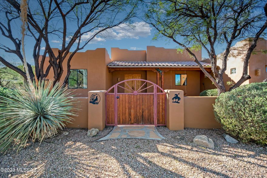 This 5-acre property is a nature lover's dream with tranquility abound. With a mountain ridge as your backyard, you can enjoy endless hiking and watch the deer come for their daily dose of carrots. The property features an extended-height awning with electricity, horse facilities with a covered stall and tack room, and a private well that provides 12 gallons of water per minute. The rustic 5-bedroom, 3-bathroom house has stained concrete floors, wood ceilings, and knotty alder cabinets. The property also has a newly added soft water system, a customized pantry & primary closet, a freshly painted exterior, and a recently re-coated roof. No HOA!