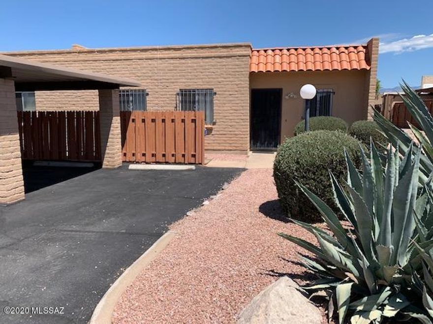 Come see this brand new listing! Lovely townhouse at an affordable price. Nice end unit in Pantano Park II comes with two parking spaces; one covered, one not. Great room is tiled and features a ceiling fan, patio door with wrought iron security screen door.  Other windows also have security bars. Ceiling fan in kitchen, walk-in pantry. Window over the kitchen sink. Electric range, refrigerator, dishwasher included. Hall closet with washer and dryer, which also convey. The three bedrooms are carpeted. Primary bedroom also has door to patio, ceiling fan, twin closets. Primary bath has been nicely updated custom tiled shower with built-in bench. Hall bath has tub/shower. Private patio with storage room. Two community pools, tennis court. Steps away from Pantano River Park. See it quick!