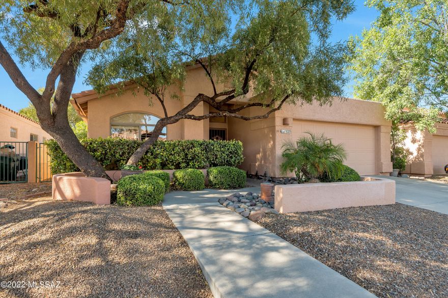 Welcome to Oro Valley Living as it was designed to be enjoyed. This beautifully maintained original owner former Model 3 bed, 2 bath, Office set up, 2 car epoxy garage Home is perfect for living the dream life. New plumbing pipes & water supply lines. Seller will share the paid in full receipt. Fresh interior paint in living areas, upgraded granite composite kitchen counters, custom shutters, & lots of built-in storage. Open & bright floor plan with vaulted ceilings. Enjoy Mtn views, view fence, backyard privacy, flagstone bench seating, manicured landscaping, citrus trees & putting green. This retreat is located next to golf course, community center, exercise facilities, pool, tennis, Drs, town municipalities, shopping, restaurants, walking paths and schools. This is the one. HOME!