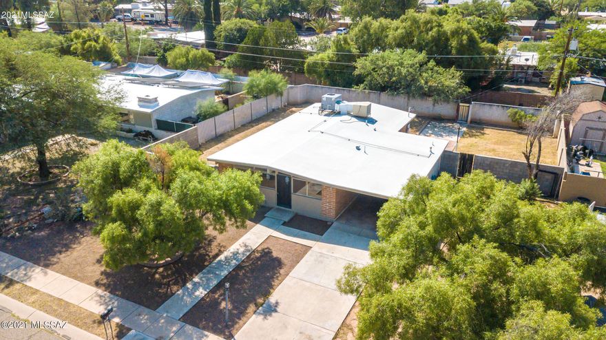 Cute move in ready three bedroom, two bathroom home with large private backyard, laundry room, recessed lighting, recent roof coating, new AC and more!