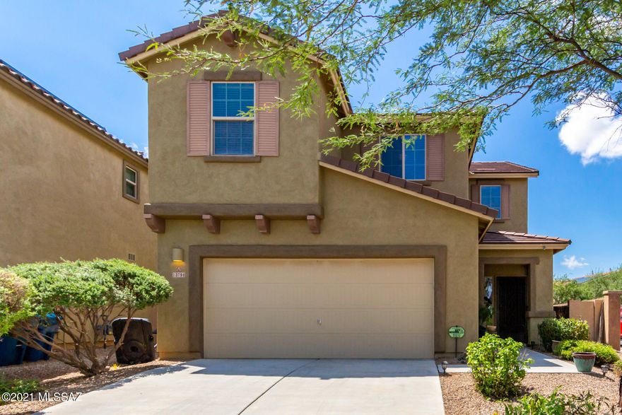 Fantastic 4 bed, 2.5 bath rental home now on the market! Located on a premium corner lot in the sought-after Community of Rancho Sahuarita. This home offers great curb appeal! Upon entering you are greeted with a spacious dining & living area. The soaring ceilings, trending palette, plush carpet, and beautiful tile floors boast throughout. The gorgeous kitchen is equipped with ample mahogany cabinetry, granite counters, recessed lighting, and an island complete with breakfast bar. Generously-sized bedrooms with large closets! Grand primary bedrooms a private en-suite, dual sinks, and walk-in closet. Charming backyard, with its covered patio and extended paver patio is the perfect place for spending quality time with friends and loved ones! Don't miss this amazing opportunity and book a showing today.