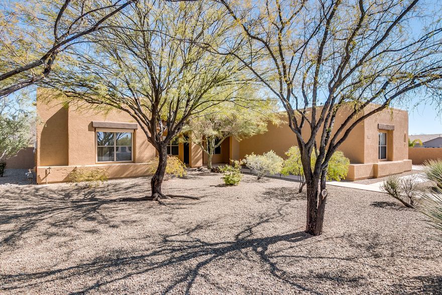 Phenomenal large home with wonderful Pusch Ridge/Catalina Mountain views.  Perfect for a car buff-has a 4 car garage   Special features include 4 bedrooms, den plus office, 3 baths, 20 inch floor tiles, some outside rolling shutters on south and east side, large back covered patio, solar panels to reduce electric costs. Laundry room has cabinets and folding counter.