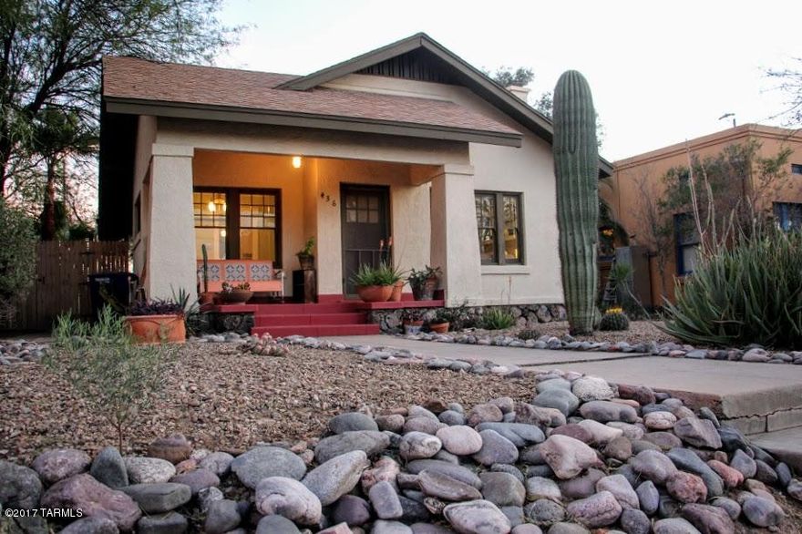 **We have an accepted offer and several in backup.  No more showings.**  Simply adorable 1923 bungalow with an inviting front porch, and a studio guesthouse in historic Feldmans neighborhood! This is the kind of charm you're looking for, with original built-ins, fireplace, wood floors, gorgeous kitchen, and fully walled backyard with huge trees and mature foliage.  Add to that a studio GH (probably unpermitted conversion) rented at $550, at the rear of the most darling shady private yard and gardens you dream of!  Studio has bath and kitchenette, but would also make an amazing art studio!  Water harvesting, custom brickwork, fruit trees. This is the one you've been waiting for!