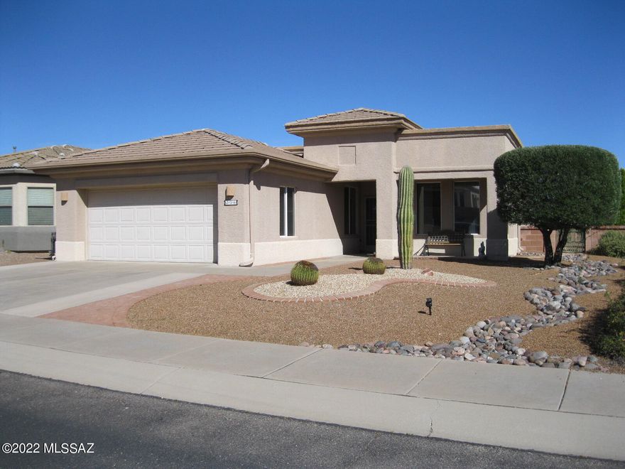 Lovely Las Campanas home centrally located in the heart of Green Valley near I-19, many shops, restaurants, farmers market  & golf courses.  Open floor plan with great room, 2 bedrooms and a den/office. All new carpet in great room, den and both bedrooms. Lots of storage in kitchen and laundry room. Covered patio and extended Pergola offers great entertainment space. New irrigation system installed in backyard January 2021. Beautiful flowering shrubs and partial mountain view.  Home is part of Green Valley Recreation (GVR) which has 13 centers with pools, spas, exercise rooms, pickle ball, tennis, etc. and offers classes in music, art, dance, games, photography, trips & more.  Home is close to one of GVRs newest recreation centers, with amenities that include pool with a chair lift, spa, fitness center, meeting rooms, kitchen for catering events, tennis courts, racquetball courts, Bocce court and an outdoor ramada.