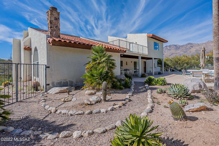 Fantastic opportunity to make this Hillside Sunrise Territory Village home your own! Double door entry into a wonderful 3 bedroom 2.5 bath home. Enjoy private pool, spa and Catalina views! Vaulted ceilings, family room with natural stone fireplace. Kitchen with granite countertops, island and eat in area/breakfast nook and built in desk. 2nd story private suite with North and East patios,  2 separate vanities, shower and separate jetted tub with a view and nice sized walk in closet.  3 car garage with very tall vaulted ceiling and storage. Needs updating and repairs: priced accordingly. Being sold AS IS.