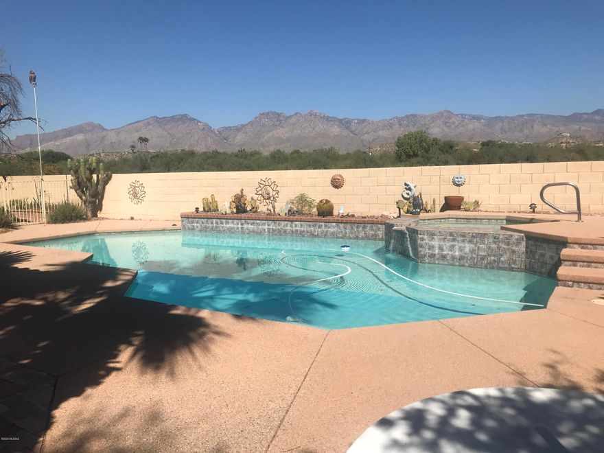 Unbelievable opportunity to have a lock-and leave home in desirable River Ranch Estates.
The owners want to sell this amazing home and the furnishings in it to one lucky person!
Start with PANORAMIC VIEWS OF THE CATALINAS AND RINCONS.  4bd/2.5ba/3car garage!  Over 2500 sqft of gracious living space. Sellers used it as a get-away home, and it shows beautifully.  Open, Bright, Vaulted Ceilings, Fabulous Views...AND a 3 car garage.  Add the Pool and Spa (with Waterfall) and what could be better?  First Home;Second Home;Rental...Only a few personal effects will be held back.  Also, the CADDY in the garage is for sale too!!!  Make an offer.  This can't wait.