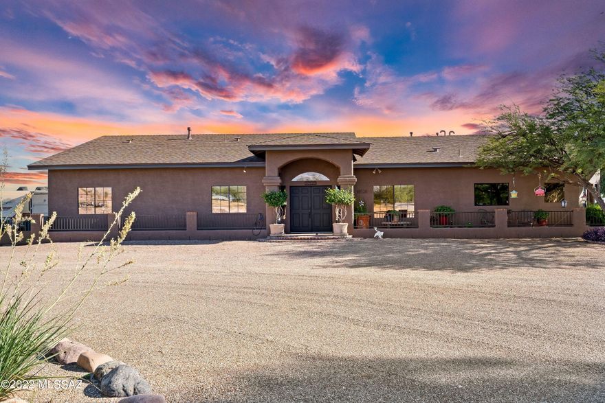 Range priced 850k to 925k seller will accept or counter in that range. Views for days!! Beautiful custom home recently updated with the finer touches. Granite throughout! Stainless appliances. All new flooring. Master bath and closet fit for a king and queen. Separate custom tub and walk in shower. Gated community with only a few custom homes. Tons of privacy. Negative edge pool/spa overlooking mountain views near Saguaro National Park. Private well with new pump and upgrades in the last year.  40 year shingle roof installed and dual AC replaced within the last 4 years.  RV parking with 30 amp plugs, water hook ups and 30 amp electric.  Don't miss this incredible opportunity!