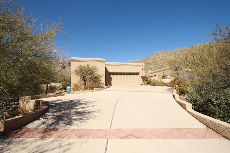 Beautiful 4bdr/3ba home in gated community of Sin Vacas! Stunning mountain views abound in this fabulous home, spacious master bedroom w/fireplace & patio. Master bedroom bath w/walk-in shower, garden tub and spacious closet.
Formal living room w/fireplace and vaulted ceilings, formal dining room, family room w/Fireplace, kitchen w/granite counters & both dining area and bar seating.
Tucson living at it's best w/stunning mountain views and sparkling pool.
POOL SERVICE INCLUDED.  LANDSCAPING SERVICE INCLUDED ON A QUARTERLY BASIS.